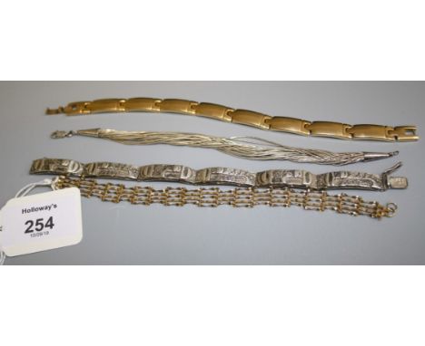 A 9ct gold gate link bracelet, an abstract link silver bracelet and two other bracelets gold bracelet 3.7g