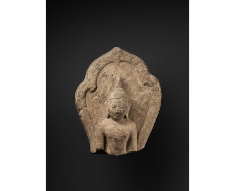 A PYU SANDSTONE FRAGMENT OF BUDDHA, 9TH-10TH CENTURYPyu city-states. The face in a serene expression with arched eyebrows abo