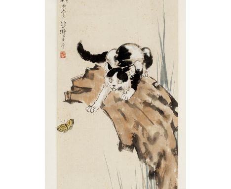 ‘CAT AND BUTTERFLY’, LINGMAO XIDIE, BY XU BEIHONG (1895-1953)Ink and watercolors on paper. Depicting a cat perched on a rocky