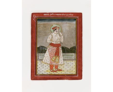 AN INDIAN MINIATURE PAINTING OF A MAHARAJAIndia, Rajasthan, circa 1800. Watercolors and gilt on paper, matted and framed behi