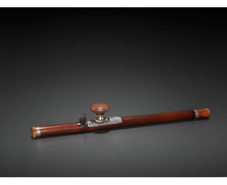 A BAMBOO OPIUM PIPE WITH IVORY, SILVER AND YIXING CERAMIC FITTINGS, LATE QING TO REPUBLICChina, late 19th to early 20th centu