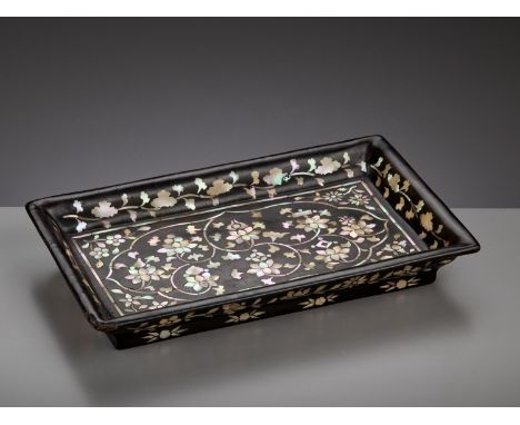 A MOTHER-OF-PEARL-INLAID BLACK LACQUER RECTANGULAR TRAY, JOSEON DYNASTYKorea, 16th-17th century. With a wide flaring rim, sup