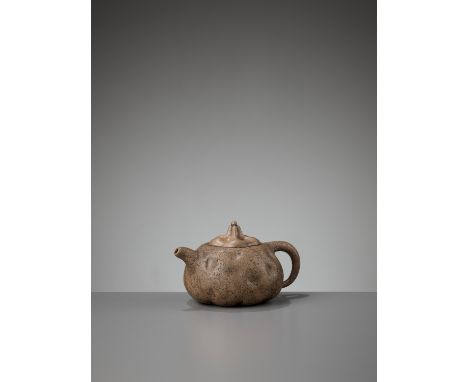 A YIXING ‘GONG CHUN’ TEAPOT AND COVER BY HUANG YULIN, LATE QINGChina, 1860-1910. Naturalistically potted in the form of a tre