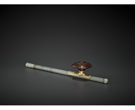 A JADE OPIUM PIPE, QING DYNASTYChina, 19th century. The pipe constructed from three pieces of celadon-gray jade, all with a f