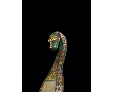 A GOLD AND SILVER-INLAID BRONZE AND JADE ‘CHILONG’ BELT HOOK, WARRING STATESChina, 4th-3rd century BC. The entire front of th