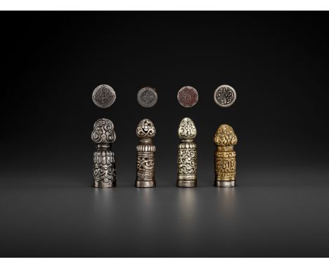 FOUR TIBETAN-CHINESE METAL ‘LOTUS’ SEALS, MID-QING TO REPUBLICTibetan-Chinese, late 18th to early 20th century. Each of colum
