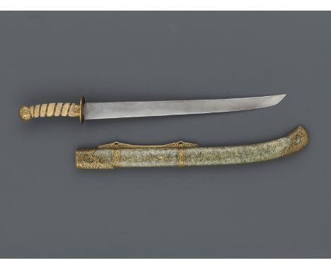 A CEREMONIAL SWORD AND SCABBARD, QING DYNASTYChina, 18th-19th century. The iron blade forged with a short groove near the tip