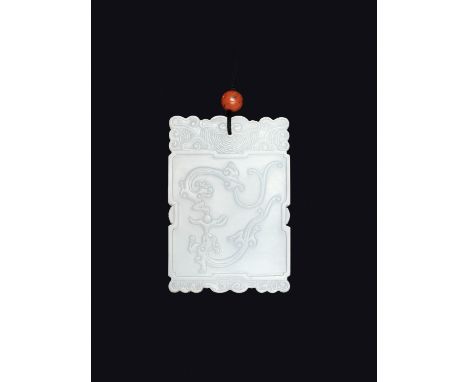 A WHITE JADE ‘FUGUI’ PLAQUE, MID-QING TO REPUBLICChina, 1750-1949. Of rectangular form, finely carved to one side in relief w