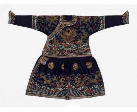 A FESTIVE ROBE, CHAO FU, QING DYNASTYChina, mid-19th century. The summer weave silk embroidered with sinuously coiled dragons