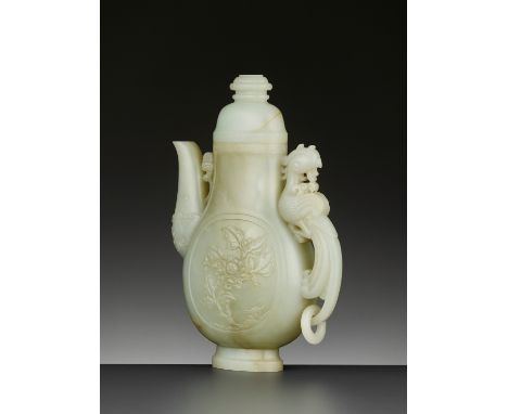 A PALE CELADON JADE ‘PHOENIX’ EWER AND COVER, QING DYNASTYChina, 18th-19th century. The stone of pale celadon tone with disti