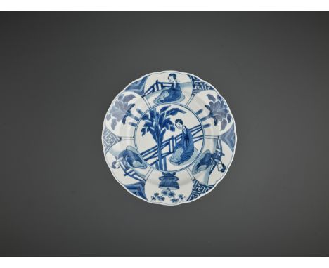 A LOBED ‘LADIES’ DISH, KANGXI MARK AND PERIODChina, 1662-1722. The shallow sides rising from a short tapering foot to a wide 