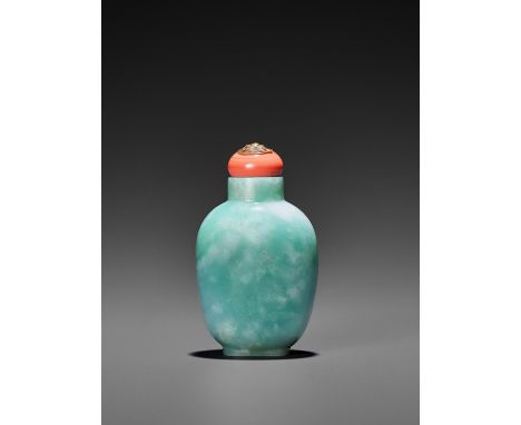 AN APPLE-GREEN AND LAVENDER JADE SNUFF BOTTLE, LATE QING TO REPUBLICChina, 1850-1940. The semitranslucent stone of an elegant