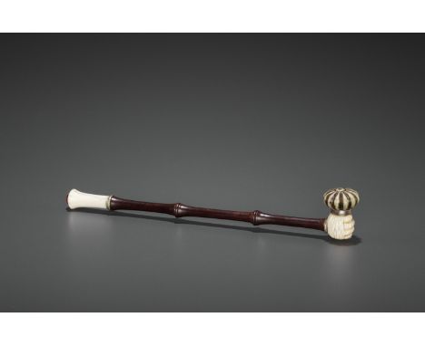 A HARDWOOD OPIUM PIPE WITH IVORY, HARDSTONE AND SILVERED COPPER FITTINGS, LATE QING TO REPUBLICChina, late 19th to early 20th