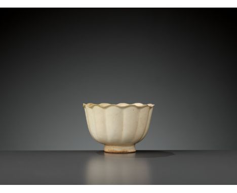 A LOBED CIZHOU ‘JULUXIAN’ WASHER, NORTHERN SONG DYNASTYChina, 1127-1279. The finely molded lobed sides raised on a slightly s
