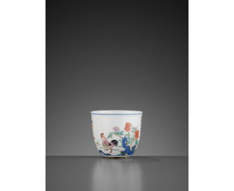 A FAMILLE ROSE PORCELAIN ‘CHICKEN’ CUP, QING DYNASTYChina, 1776-1880. Inscribed with an imperial poem by the Qianlong Emperor