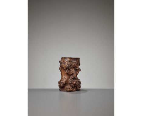 A BURLWOOD ‘TREE TRUNK’ BRUSH POT, BITONG, QINGChina, 18th-19th century. Of attractive form and proportions, the wood with se