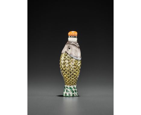 A LARGE MOLDED AND ENAMELED PORCELAIN ‘LEAPING CARP’ SNUFF BOTTLE, QING DYNASTYChina, 19th century. Finely molded and painted