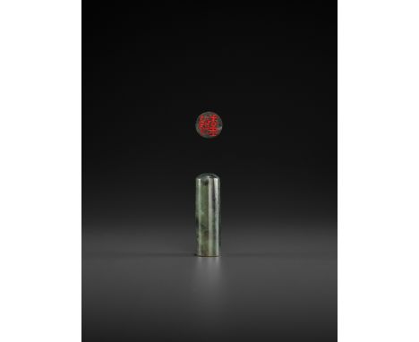 A SPINACH-GREEN JADE SEAL, MID-QING TO REPUBLICChina, late 18th to early 20th century. Of cylindrical form with a slightly do