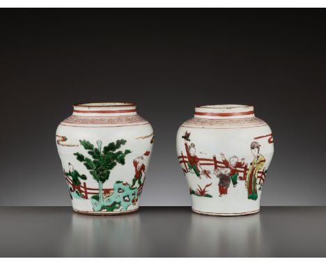 A PAIR OF IRON-RED AND ENAMEL-DECORATED ‘BOYS’ JARS, TIANQI PERIODChina, 1621-1627. Each with a baluster shaped body rising f