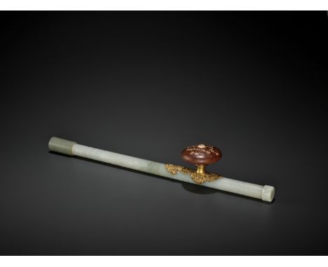 A JADE AND GILT-BRONZE ‘WUFU’ OPIUM PIPE, QING DYNASTYChina, 18th-19th century. The pipe constructed from three pieces of cel