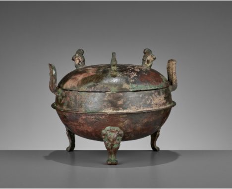 AN ARCHAIC BRONZE RITUAL TRIPOD VESSEL AND COVER, DING, WARRING STATESChina, 475-221 BC. The vessel and cover of compressed g