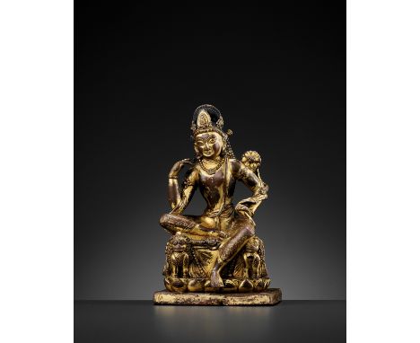 A RARE GILT-COPPER FIGURE OF PADMAPANI, NEPAL, LICCHAVI OR TRANSITIONAL PERIODNepal, 9th-12th century. Seated in royal ease o