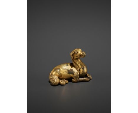 A RARE GILT BRONZE ‘RECUMBENT HOUND’ WEIGHT, MING OR EARLY QINGChina, 1368-1700, most likely early 15th century. Shown with h