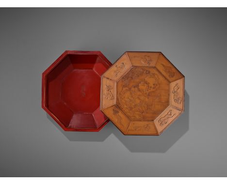 AN OCTAGONAL ‘EROTIC’ BAMBOO VENEER BOX AND COVER, ZHUHUANG, QING DYNASTYChina, 1644-1912. The top of the cover carved in low