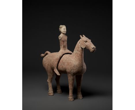 A LARGE PAINTED GRAY POTTERY EQUESTRIAN GROUP, CHINA, EARLY WESTERN HAN DYNASTY, 2ND CENTURY BCThe rider well modeled separat