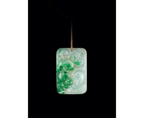 AN APPLE- AND EMERALD-GREEN JADEITE ‘LINGZHI’ PLAQUE, QING DYNASTYChina, 1644-1912. Of rectangular form, carved in relief wit