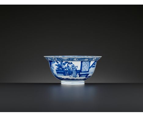 A BLUE AND WHITE ‘KLAPMUTS’ BOWL, KANGXI MARK AND PERIODChina, 1662-1722. The rounded sides rising from a short foot to a wid