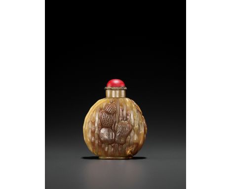 AN AGATE ‘JUJUBE AND PEANUT’ SNUFF BOTTLE, LATE QING TO EARLY REPUBLICChina, 1820-1920. Carved in high relief with peanuts an