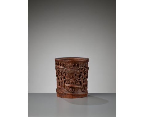 A LACQUERED BAMBOO RETICULATED BRUSH POT, BITONG, MID-QINGChina, 18th century. Masterfully carved around the exterior in vary