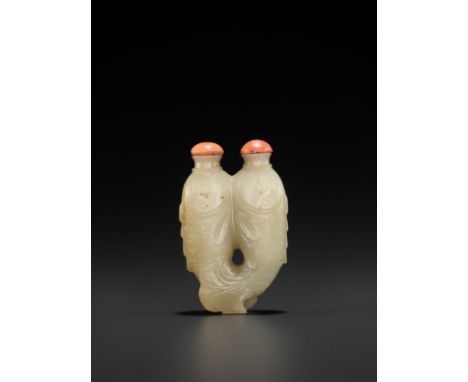 A CELADON JADE ‘DOUBLE FISH’ SNUFF BOTTLE, QING DYNASTYChina, 1750-1870. The twin bottle is well carved and well hollowed as 