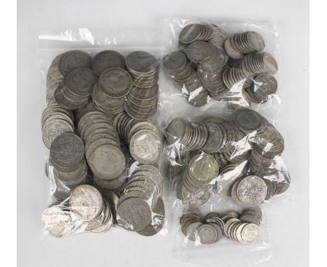 A large collection of British pre-1947 silver coinage, comprising half-crowns, florins, shillings and sixpences.Buyer’s Premi