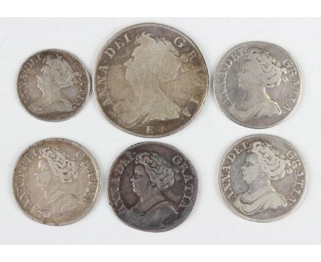 A small collection of Queen Anne silver coinage, including a shilling 1711, a sixpence 1711 and a half-crown 1708 Edinburgh M