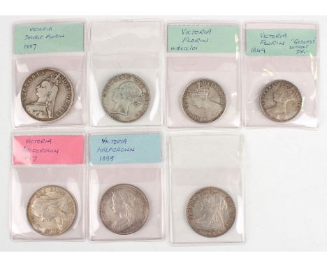 A small collection of Victorian silver coinage, including a Victoria Godless florin 1848 and two Veiled Head half-crowns, 189