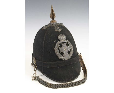 Rifle Brigade (Prince Consorts Own) Other Ranks Home Service Helmet having a blackened brass spike over a black melton cloth 