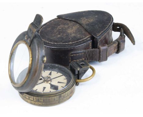 A Beor War period British military Mk IV prismatic compass, the hinged cover marked London 1899, the back cover with WD arrow