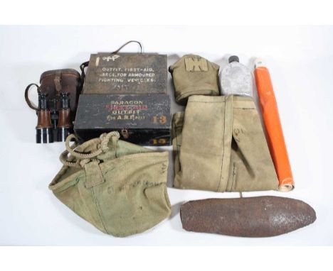 A collection of miscellaneous militaria to include a pair of WWI period binoculars in brown stitched leather case, embossed G