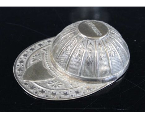 A novelty silver tea caddy spoon in the form of a jockey's cap, having a vacant cartouche to the peak, Whitehill Silver &amp;