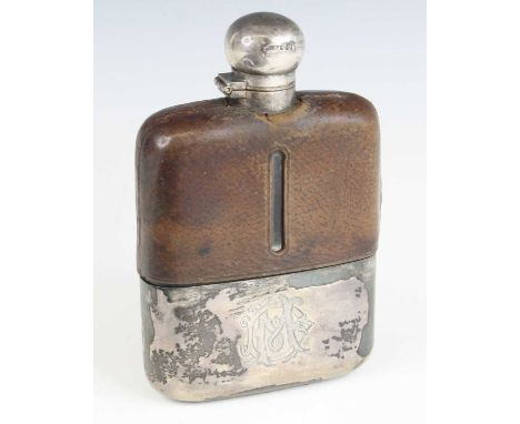 A late Victorian hip flask, having a leather covered glass body with removeable silver cup and silver bayonet cap, James Dixo