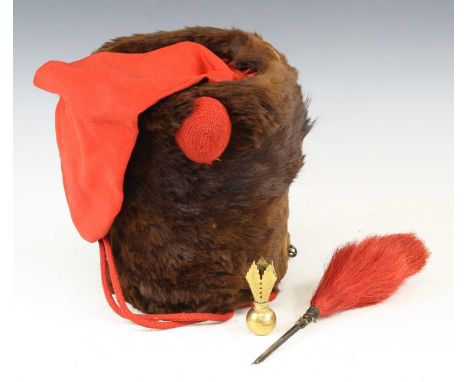 A Victorian Royal or Volunteer Officer's brown fur busby, the scarlet bag to the crown falling to the right with red braid kn