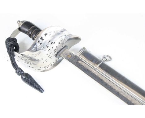 An 1892 pattern Infantry Officer's sword, having a 82cm blade etched with a crowned ER VII cypher, the pierced steel bowl hil