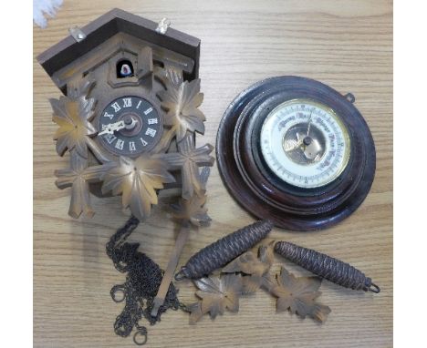 A cuckoo clock and a barometer