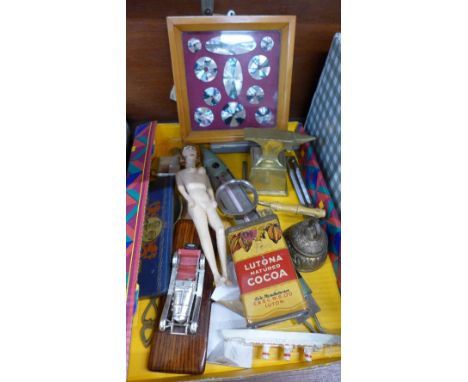 A Churchill handkerchief, framed mother of pearl tokens, a small brass anvil, a carved doll, thermometers, a lighter, a magni