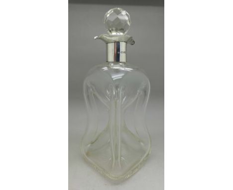A Victorian silver rimmed decanter with double lip, Chester 1899
