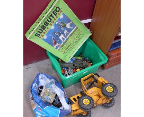 Die-cast vehicles including Dinky and Matchbox, plastic toy figures, a Tonka toy and Subbuteo