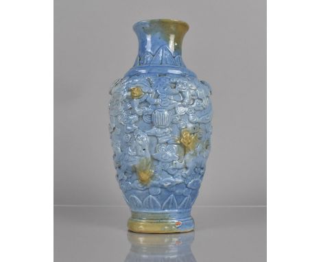 A Chinese Fahua Ware Type Vase decorated in Shallow Relief with Temple Lions amongst Scrolled Sky, Blue Glazed, Seal Mark to 