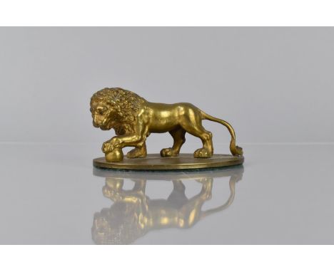 A Gilt Bronze Study of a Medici Lion, Mounted on Oval Base, 11cms Wide and 5cms High 
